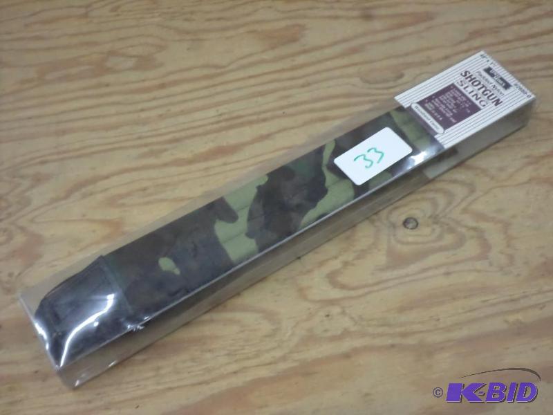lot 33 image: New Uncle Mikes Padded Nylon Shotgun Sling...