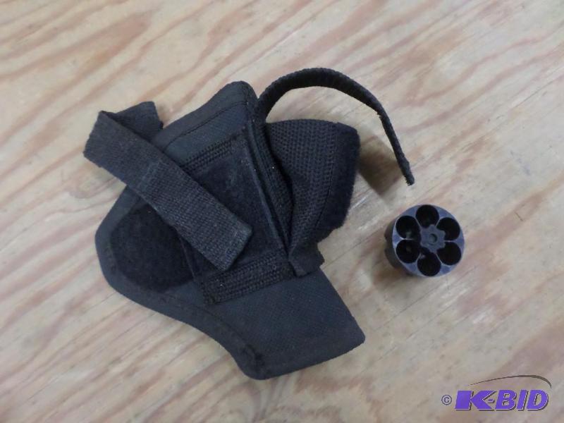 lot 36 image: Belt-Clip Pistol Holster With Quick-Load Syst...