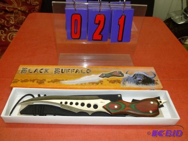 lot 21 image: 16" Black buffalo knife. New in the box....