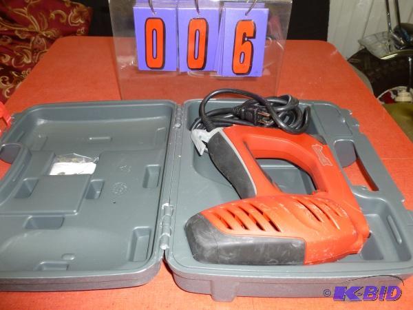 lot 6 image: ET 50 red arrow electric stapler. With case a...