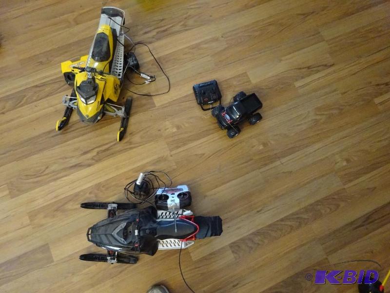 lot 96 image: 2 Snow Mobiles and Truck Remote Control