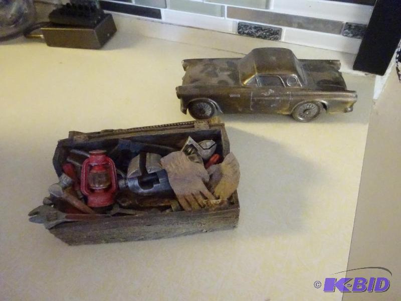 lot 99 image: Tool Nic Nac and Thunderbird Penny Bank