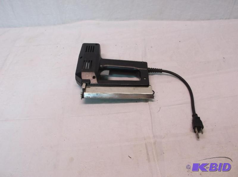 lot 103 image: Power Fast electric nail gun....