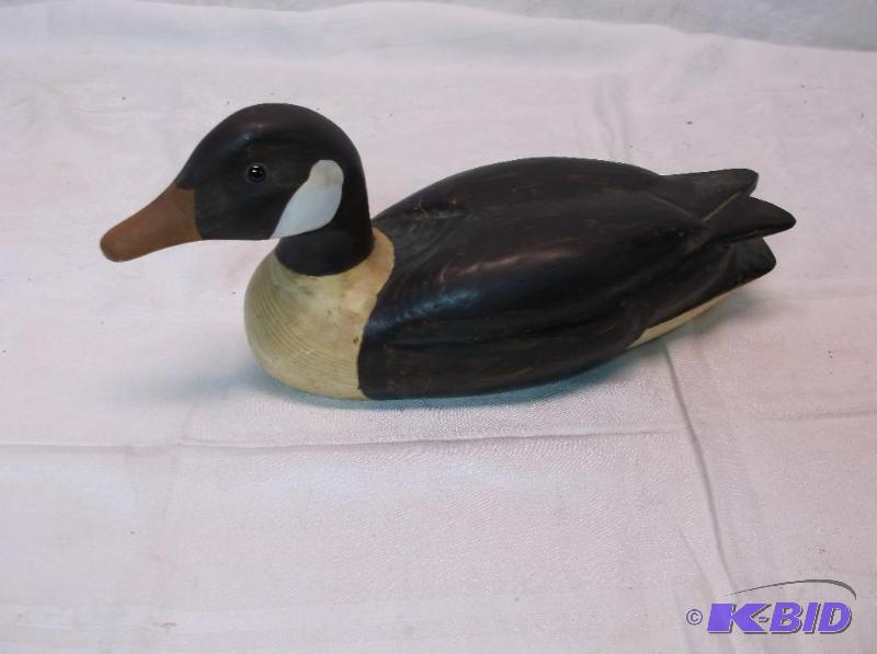 lot 109 image: Beautiful wood carved duck measuring 12 12&q...