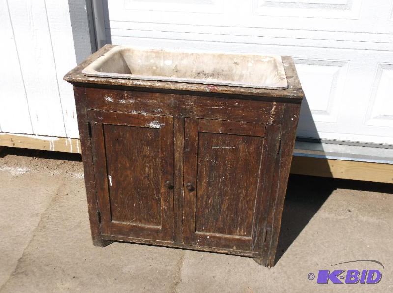 lot 128 image: Vintage vanity with cast iron sink measuring ...