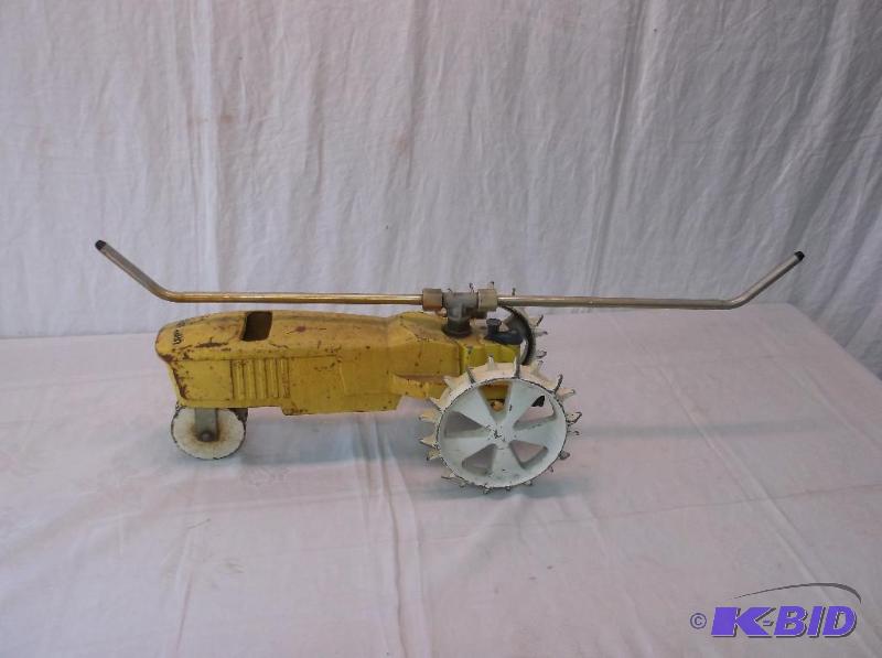 lot 146 image: Heavy cast iron tractor lawn sprinkler....