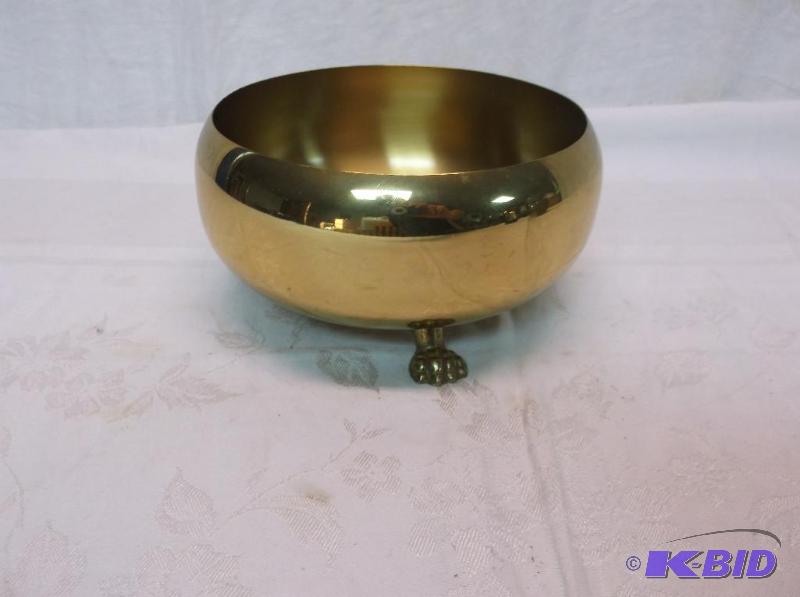 lot 162 image: Large solid brass footed dish measuring 7&quo...