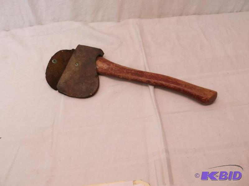 lot 46 image: Hatchet with sheath in good usable condition....
