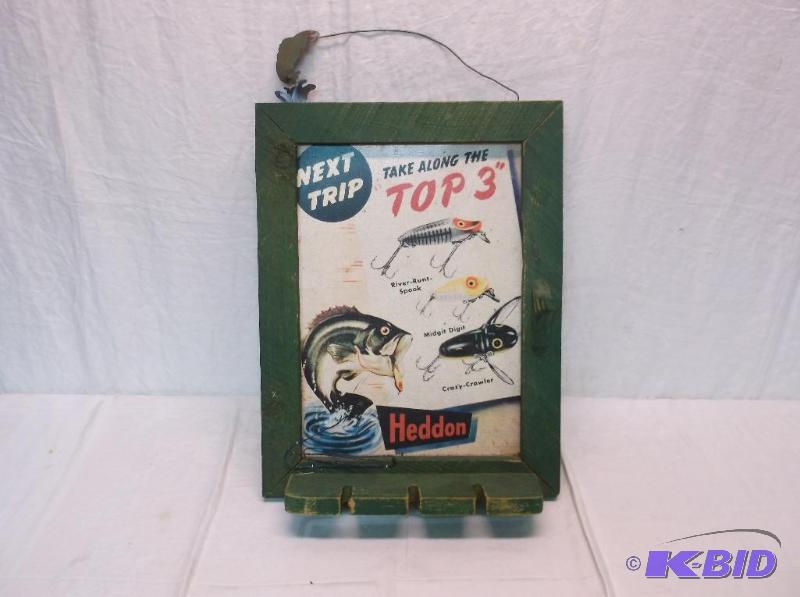 lot 56 image: Framed metal sign with fishing rod holder mea...