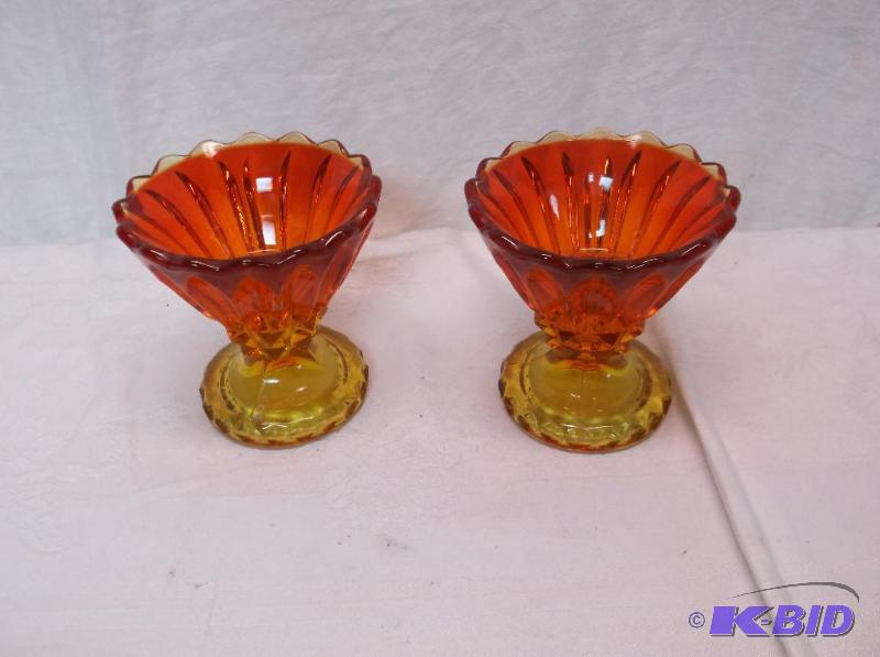 lot 63 image: Beautiful amberina glass candle holders in gr...