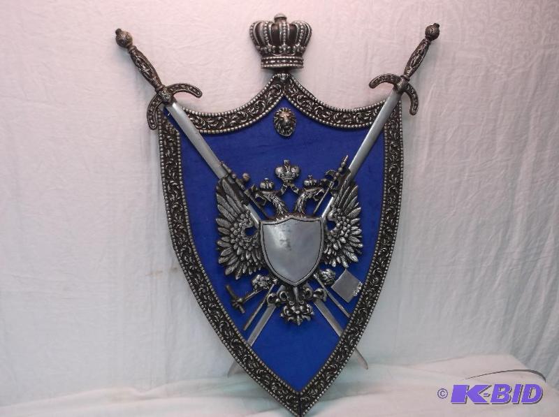 lot 73 image: Large decorative shield with swords measuring...