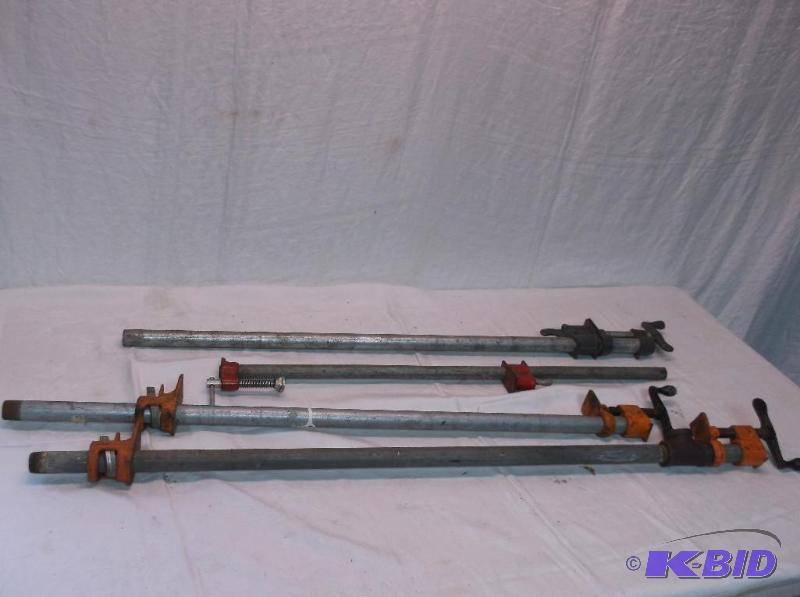 lot 98 image: Wood clamps longest measuring 40" smalle...