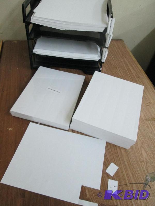lot 15 image: Plastic file sorter with several reams of 8.5...