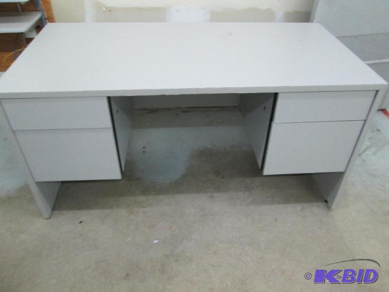 lot 7 image: Sturdy desk, top is 5 feet by 30 inches and s...