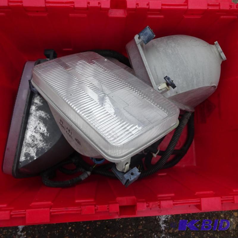 lot 17 image: 4 headlights off of P-30 truck chassis. Utili...