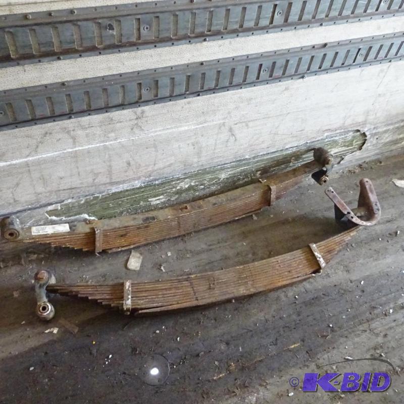 lot 22 image: Springs off of a P-30 Chevy truck frame. 22-6...