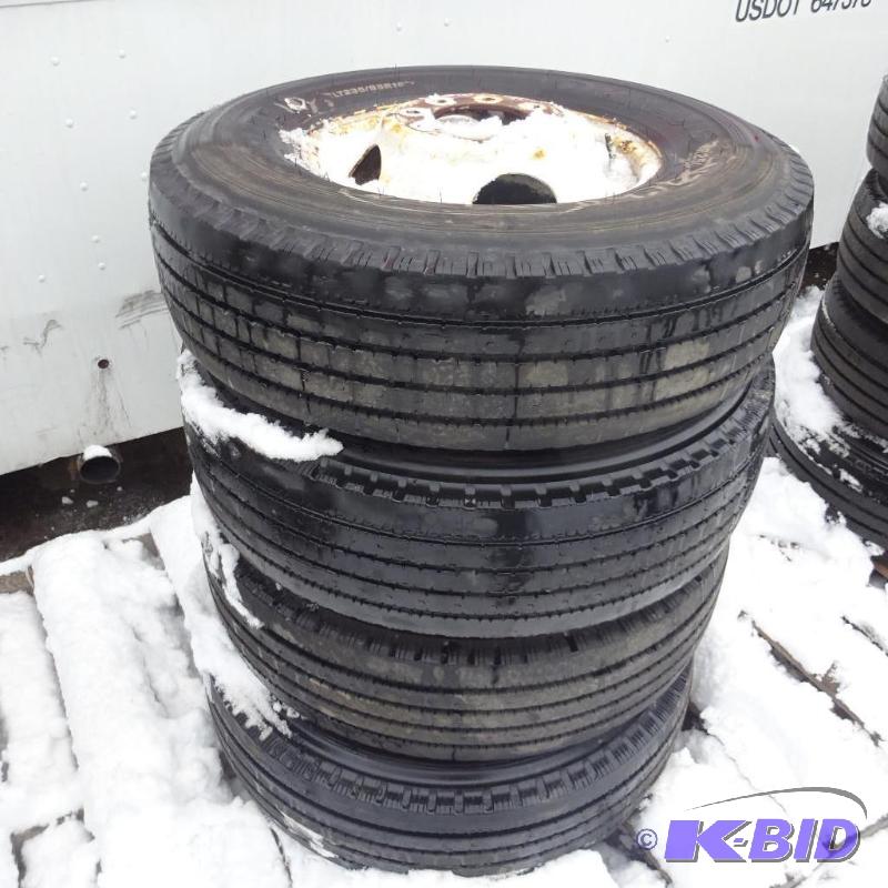 lot 3 image: Bridgestone LT235 85R16 tires and rims. Came ...
