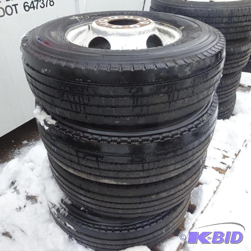 lot 4 image: Bridgestone LT215 85R16 tires and rims. Load ...