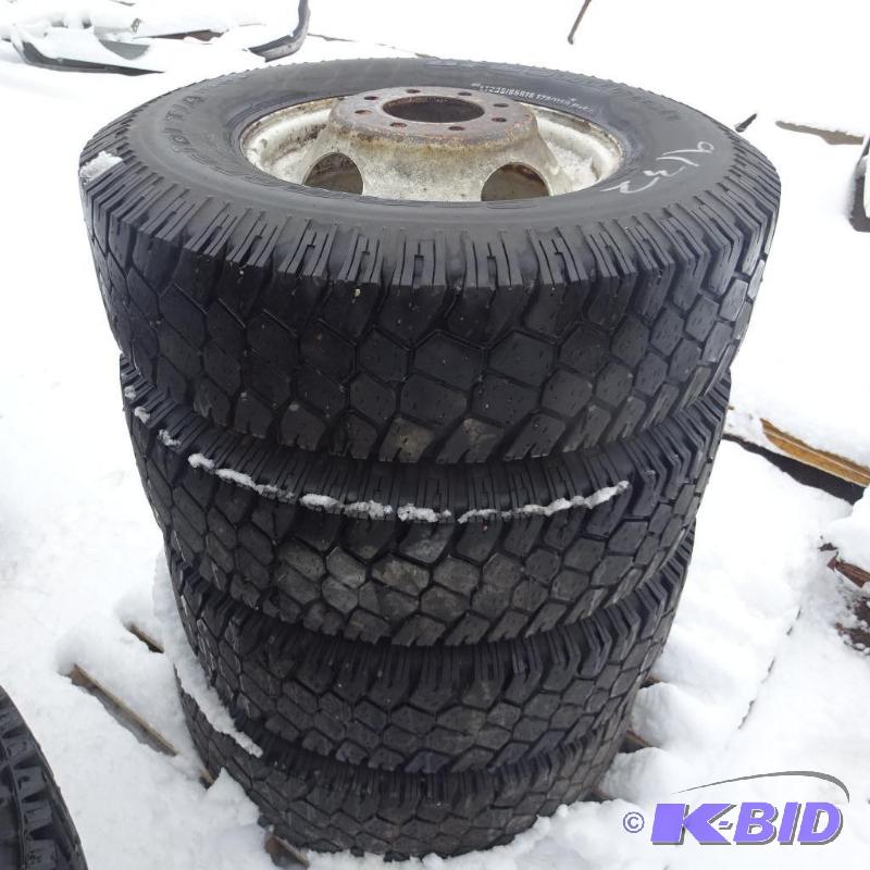 lot 7 image: Firestone drive tires. 235 85R16 tires and ri...