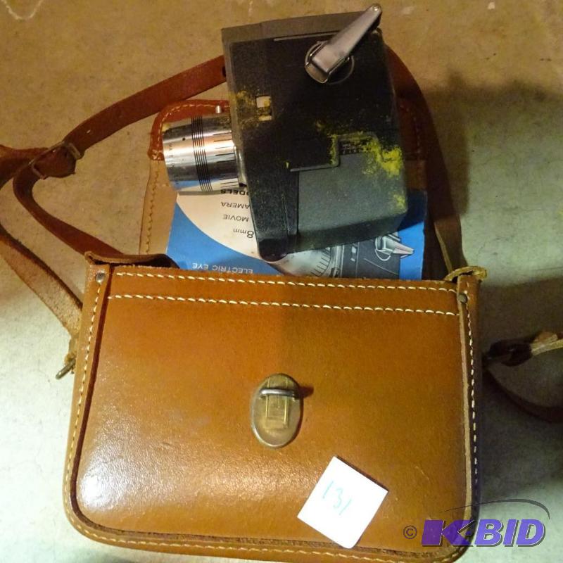 lot 131 image: Bell and Howell Movie Camera...