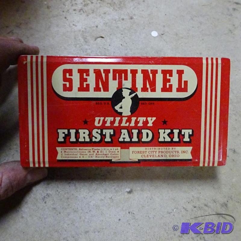 lot 388 image: Vintage Sentinel metal tin first aid kit. Emp...