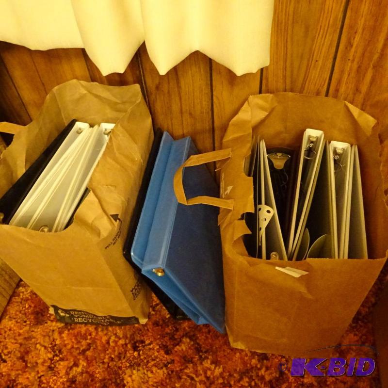 lot 394 image: 3 ring binders...
