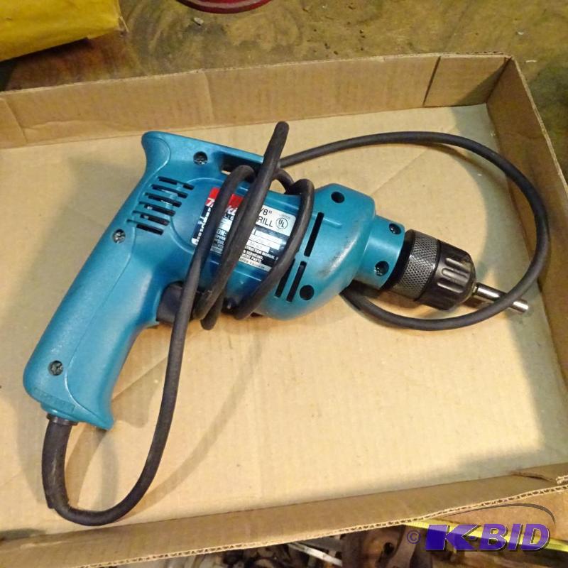 lot 82 image: Makita 38 Drill...