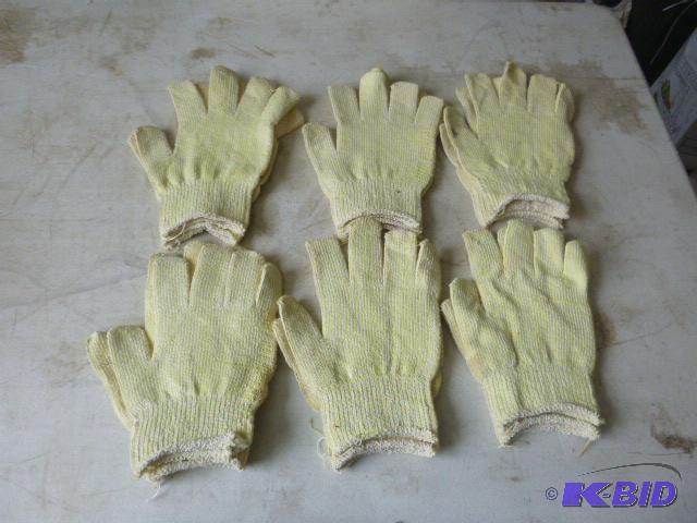 6 Pairs of Gloves One size fits all....