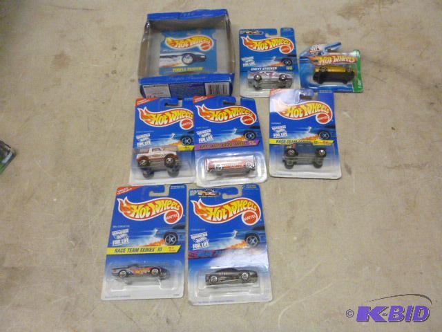 8 Hot Wheels Cars...