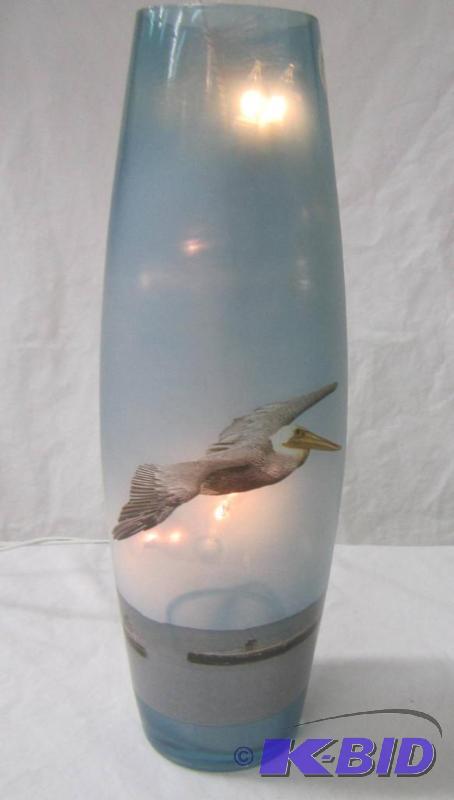 lot 557 image: NEW  12 High Lighted Electric Lamp with Pelican