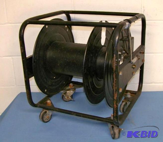 lot 63 image: Large, Rolling  Portable AudioVideoComputer Cable Spool Cart with Brake Lever