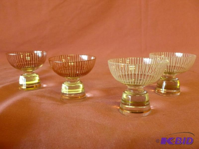 lot 140 image: Lot of four vintage sake glasses that measure...