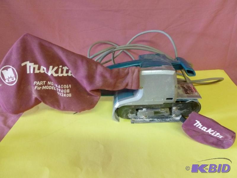 lot 16 image: Makita heavy duty 3" belt sander with ba...
