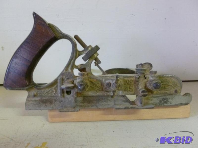 lot 34 image: Vintage Stanley No. 45 specialty wood plane, ...