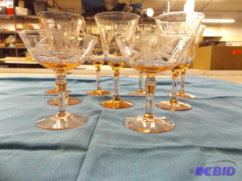 lot 271 image: Pink glass wine goblets and dessert glasses...