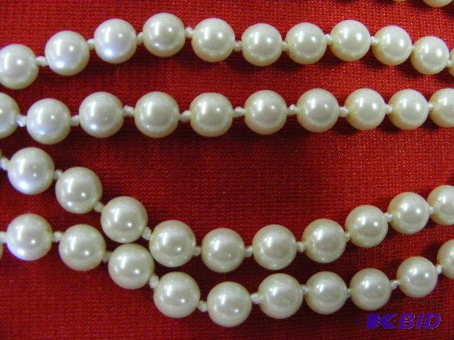 lot 28 image: 60 pearl Tie from JCPenney...