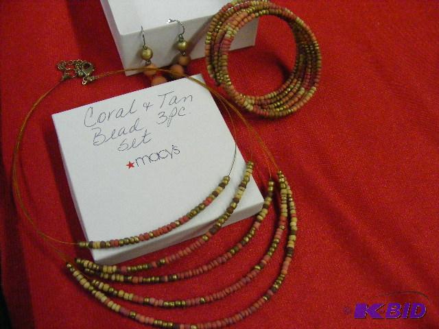 lot 36 image: Macys coral and tan bead set...