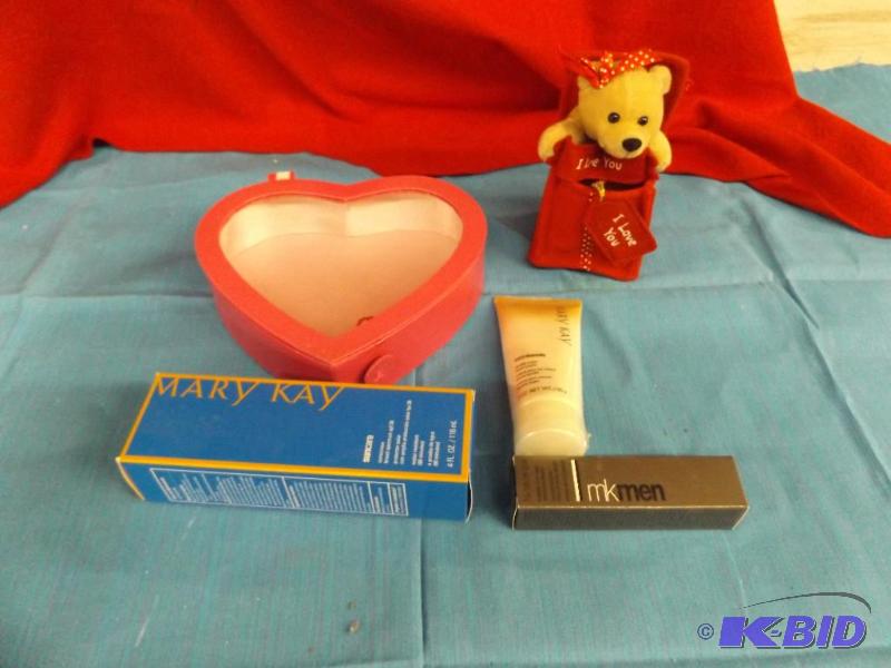 lot 45 image: Mary Kay Items and a heart shaped box...