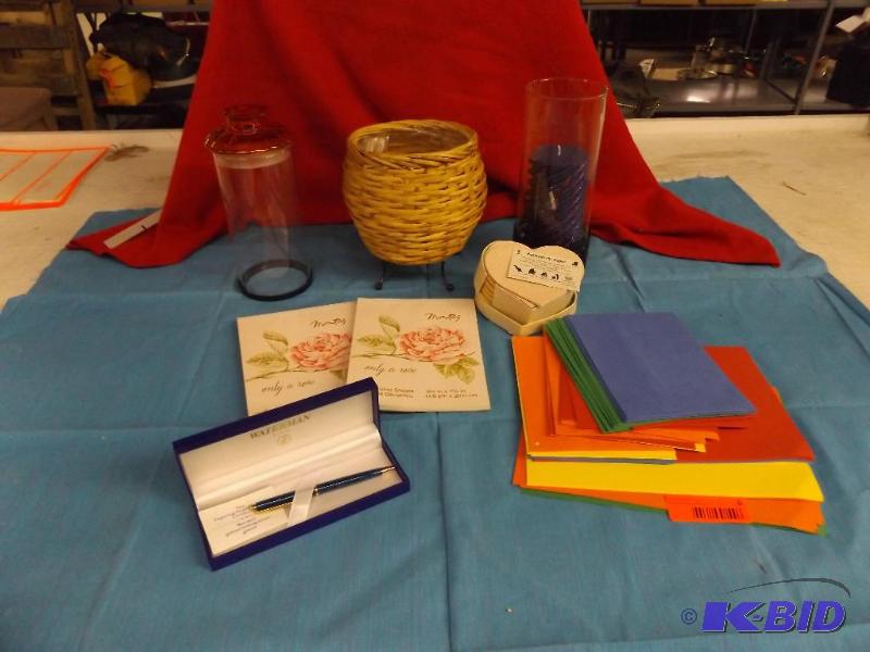 lot 6 image: Candle and Holder, basket, colored paper, Pac...