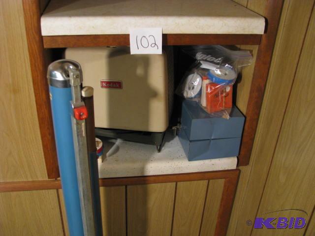 lot 102 image: vintage film projector and retractable portab...