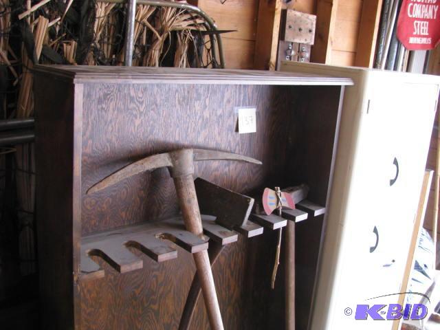 lot 137 image: wooden gun rack bonus items are a pick axe, h...