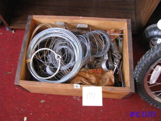 lot 171 image: wire fence parts in a wooden box...see photos...