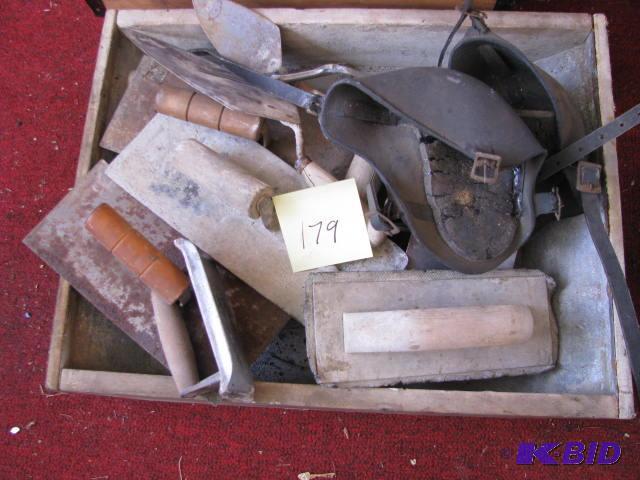lot 179 image: masonry items tin box and many trowels, scrap...
