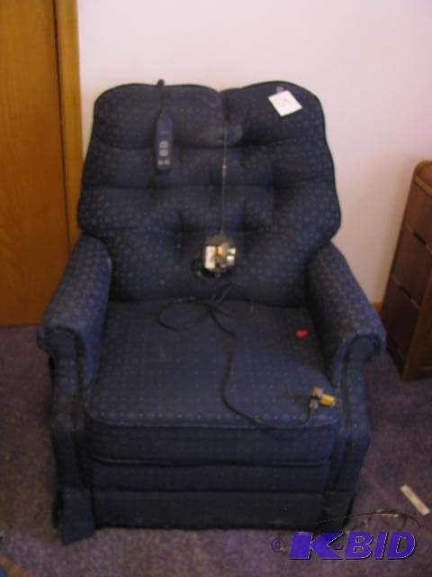 lot 54 image: An Okin&nbspEasy Lift chair, electric, in na...