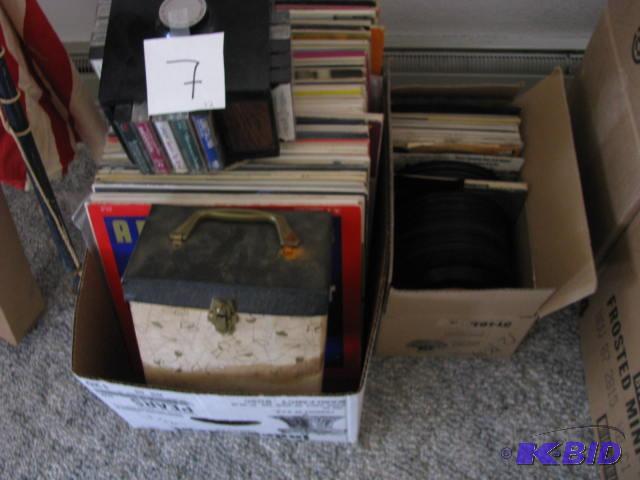 lot 7 image: Box of albums, a cassette carousel&nbspand a...