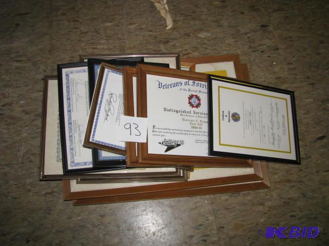 lot 93 image: stack of framed certificates, VFW, State of M...