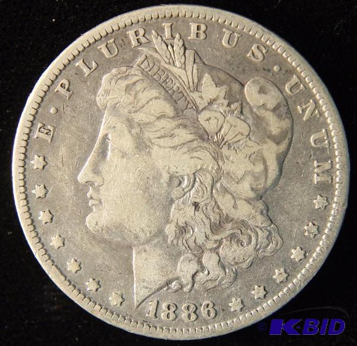 1886 O MORGAN SILVER DOLLAR VF