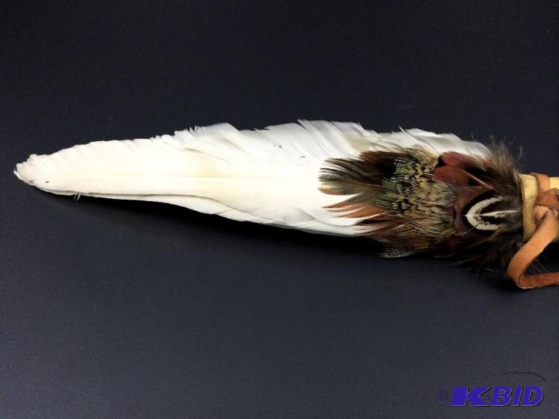 Authentic Ceremonial Smuge Feathers, wrapped in hand tooled soft leather..
