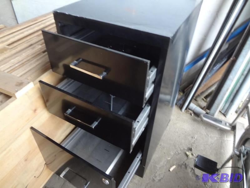 Three File Cabinets
