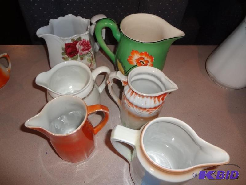 Six Porcelain Pitchers